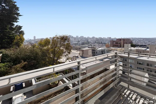 a view of a city view from a balcony