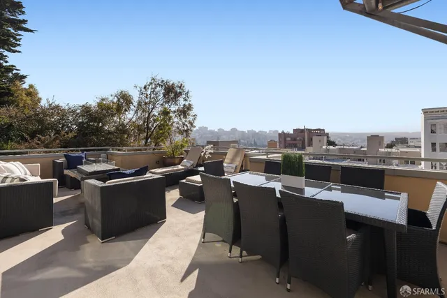 a view of a tables and chairs in the terrace