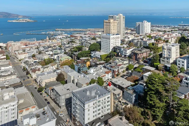 a view of city with ocean
