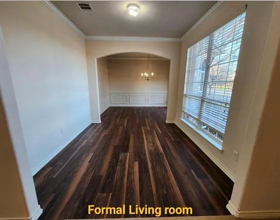 a view of livingroom with hardwood floor and window