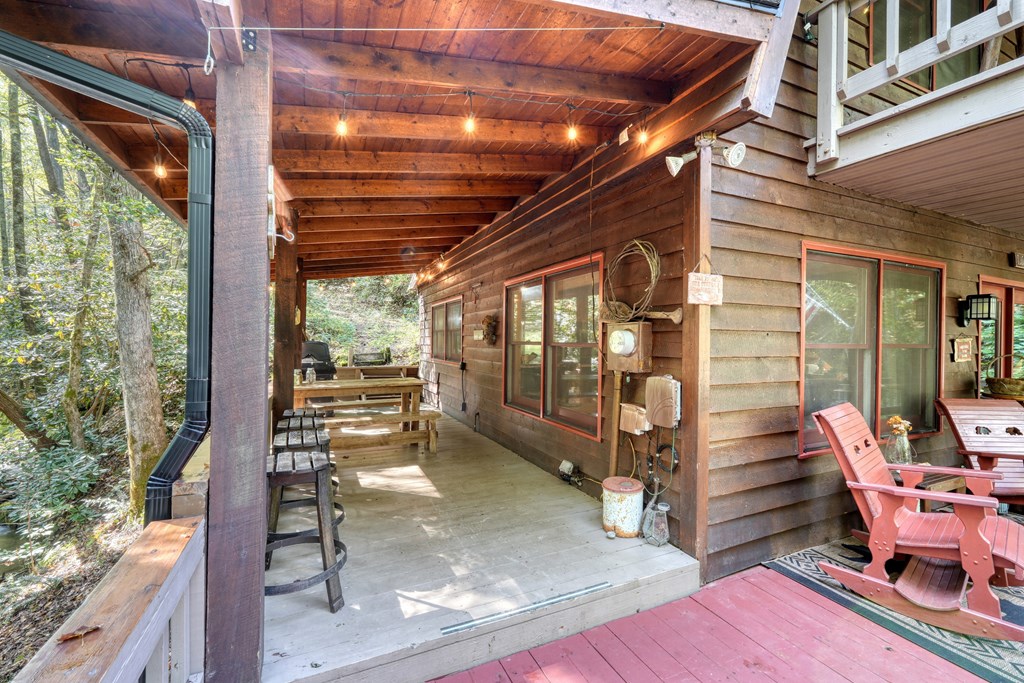 4836 Swallows Creek Road Hiawassee, GA 30546 - Photo 36 of 57 a view of a porch with furniture