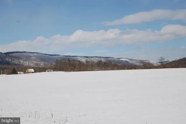 a view of lake and mountain