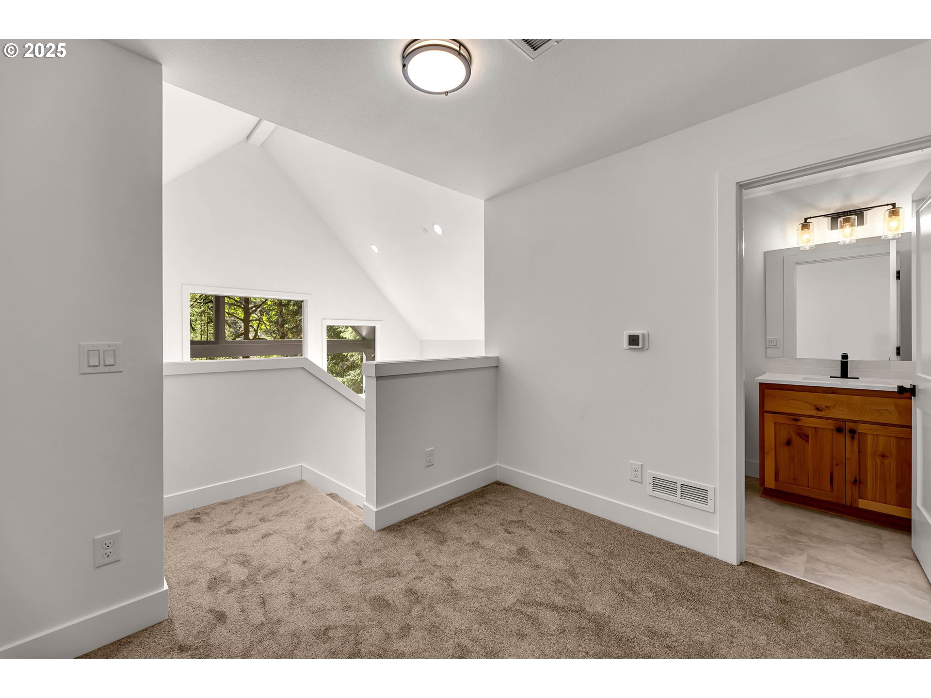 36403 Northeast 267th Street Yacolt, WA 98675 - Photo 19 of 33 view of an empty room and kitchen