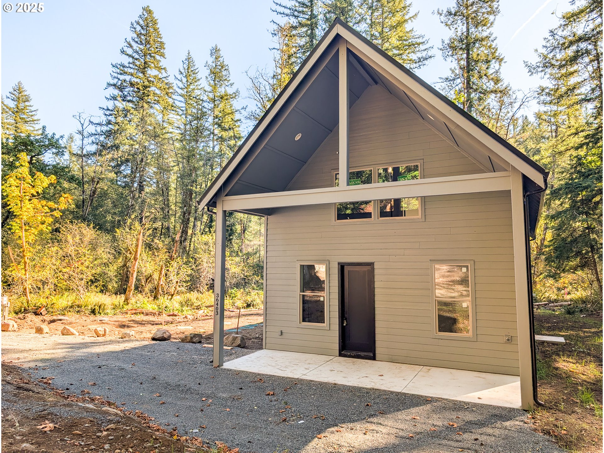 36403 Northeast 267th Street Yacolt, WA 98675 - Photo 3 of 33 a front view of a house with a yard