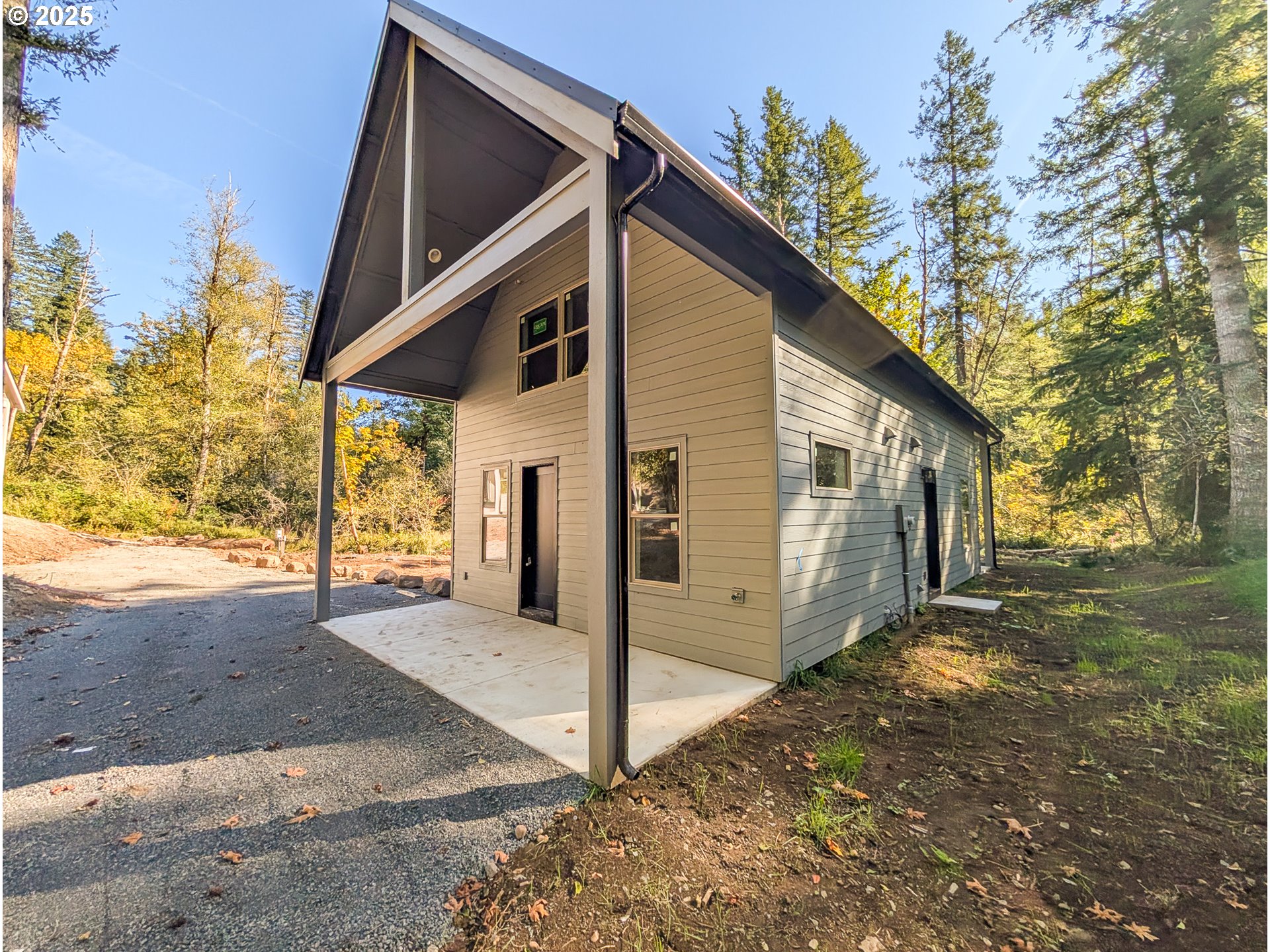 36403 Northeast 267th Street Yacolt, WA 98675 - Photo 4 of 33 a view of a house with a yard
