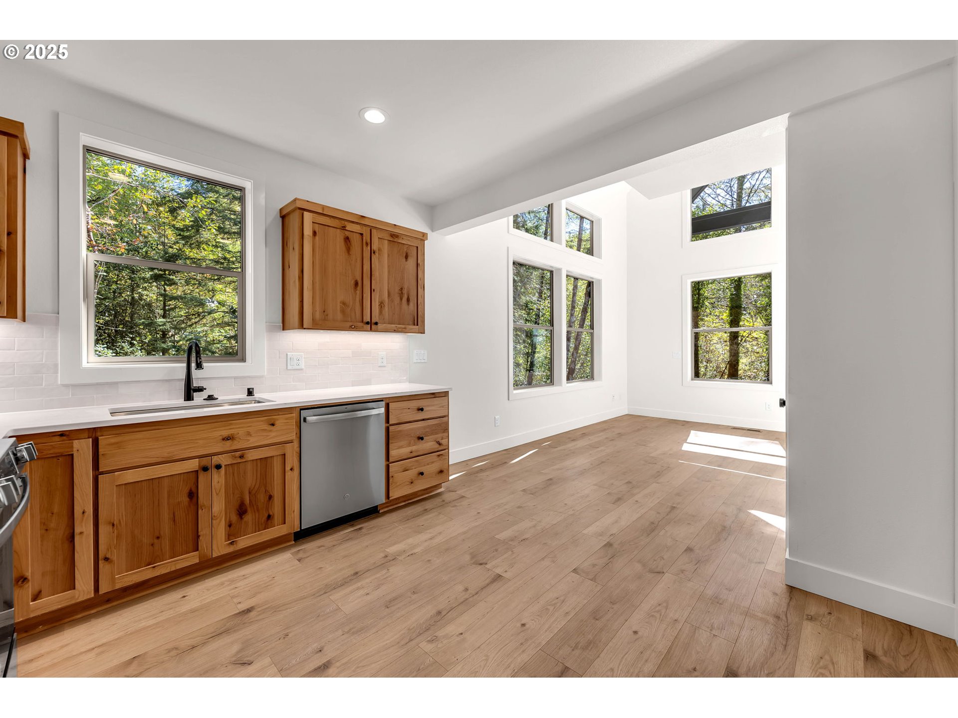 36403 Northeast 267th Street Yacolt, WA 98675 - Photo 6 of 33 a bathroom with a sink windows and a bathtub