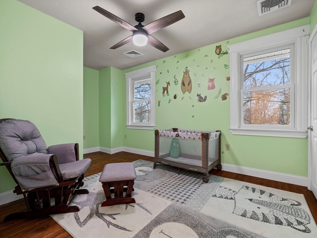55 Kellogg Street Framingham, MA 01701 - Photo 28 of 42 a living room with furniture and a window