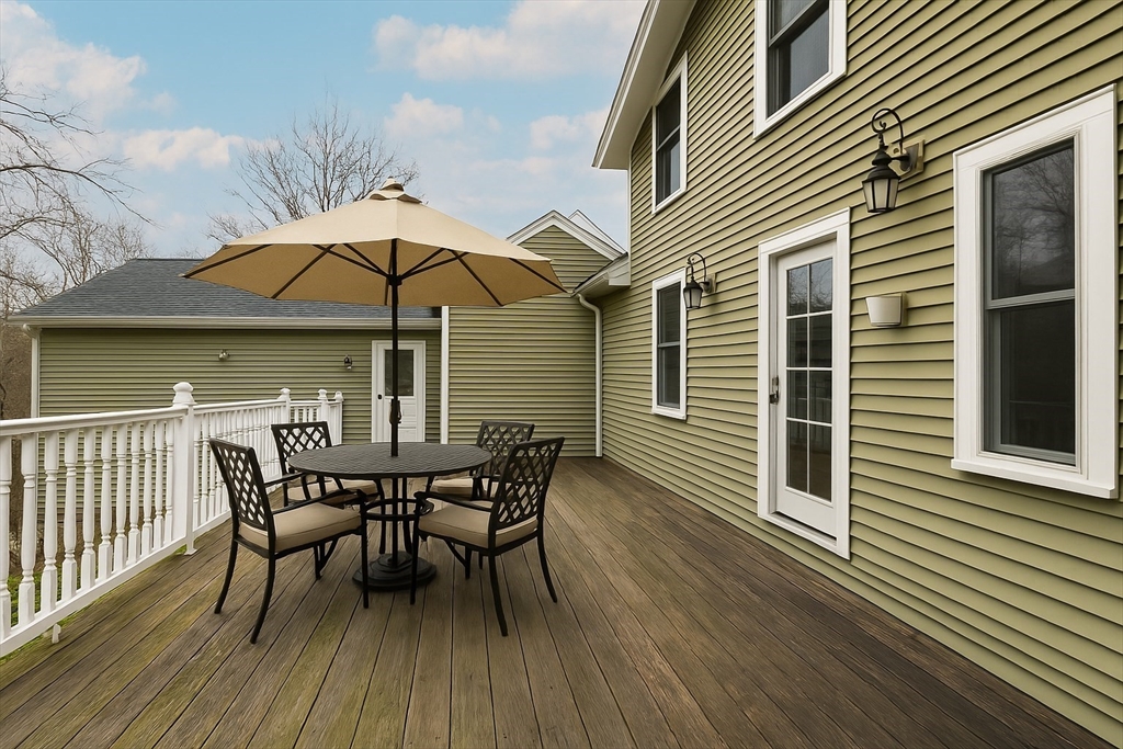 55 Kellogg Street Framingham, MA 01701 - Photo 31 of 42 a patio with table and chairs