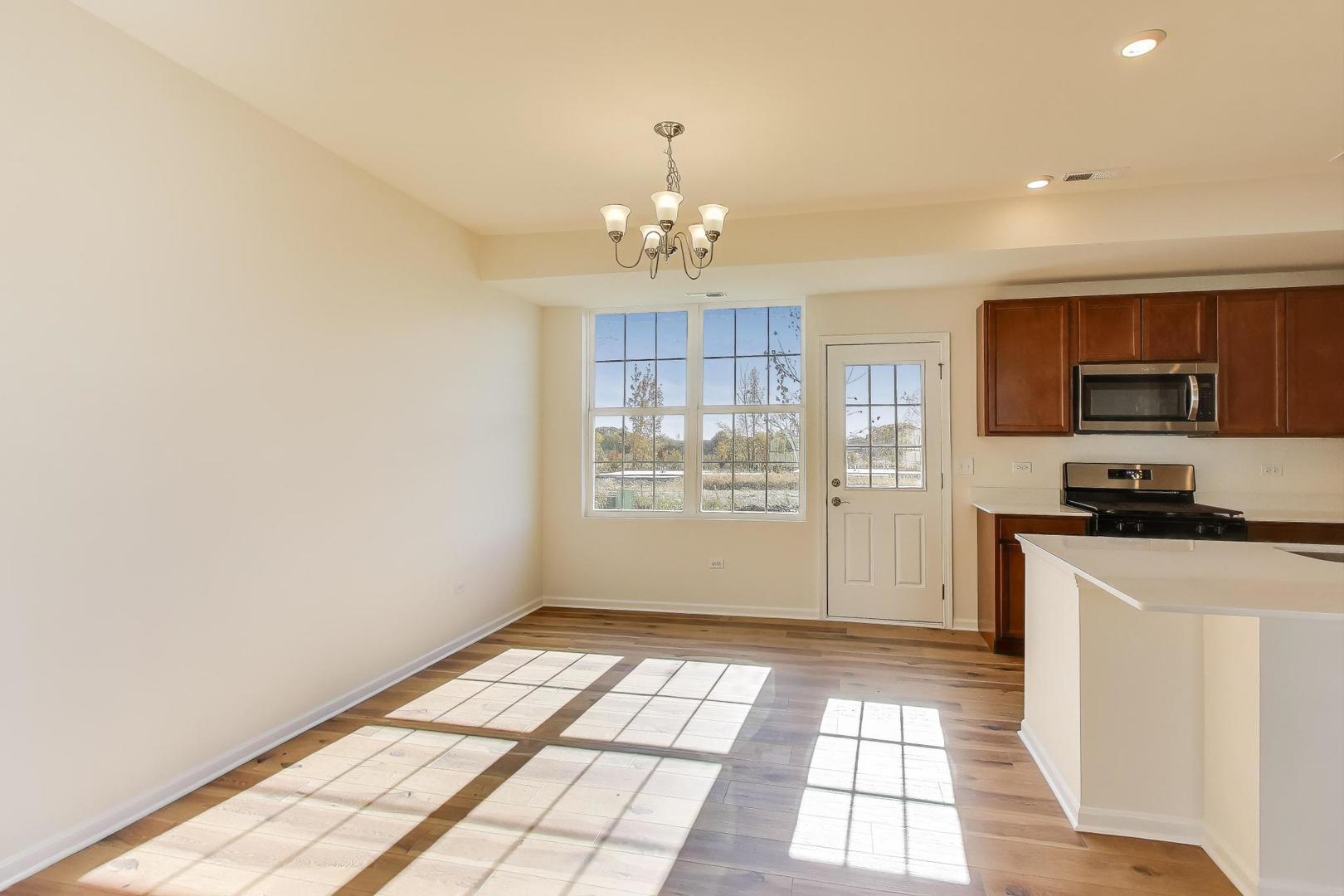 1003 Celebration Drive Aurora, IL 60504 - Photo 12 of 35 a view of a kitchen with electric appliances