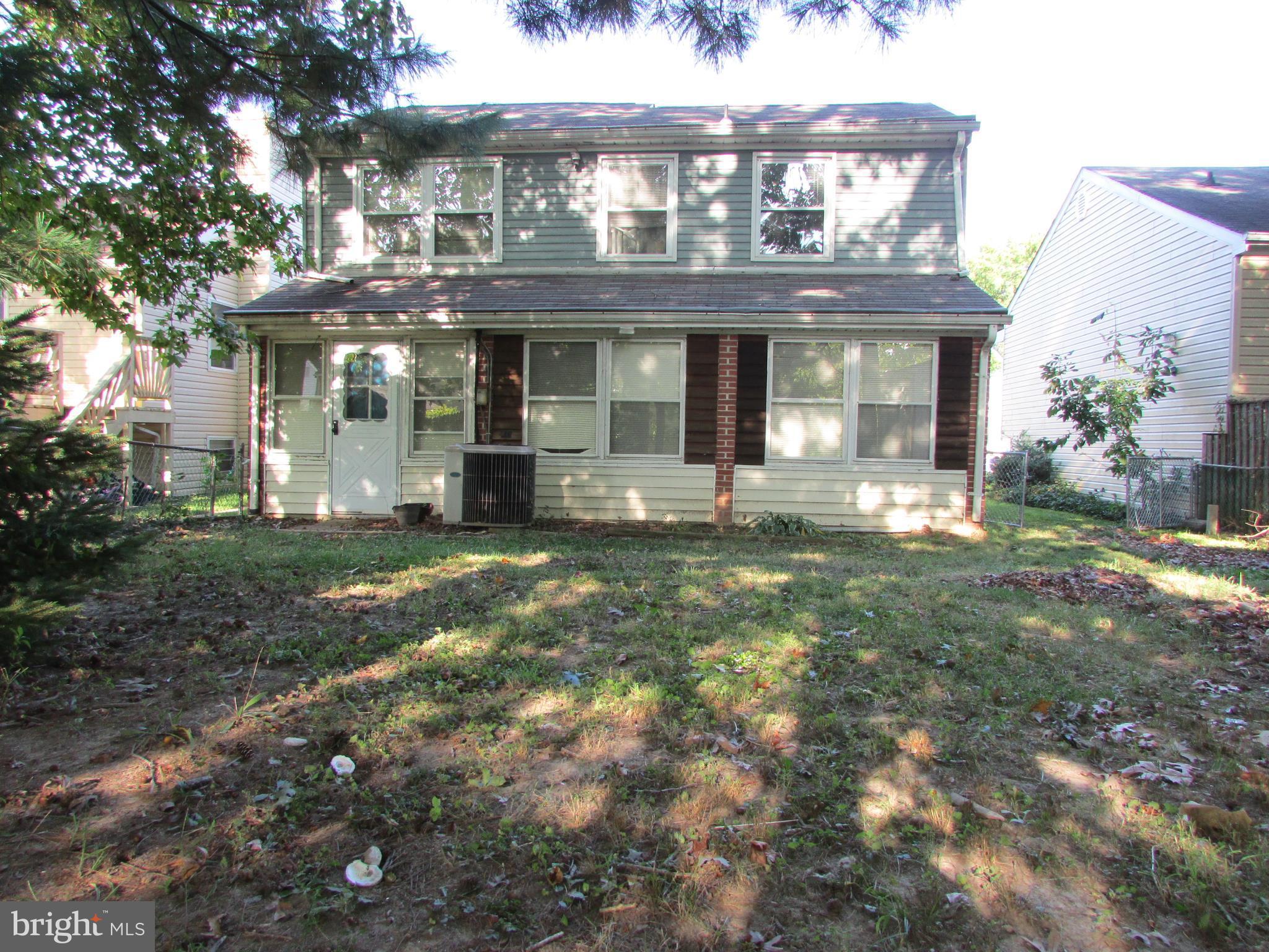 124 Redbud Road Edgewood, MD 21040 - Photo 2 of 12 a front view of a house with a yard