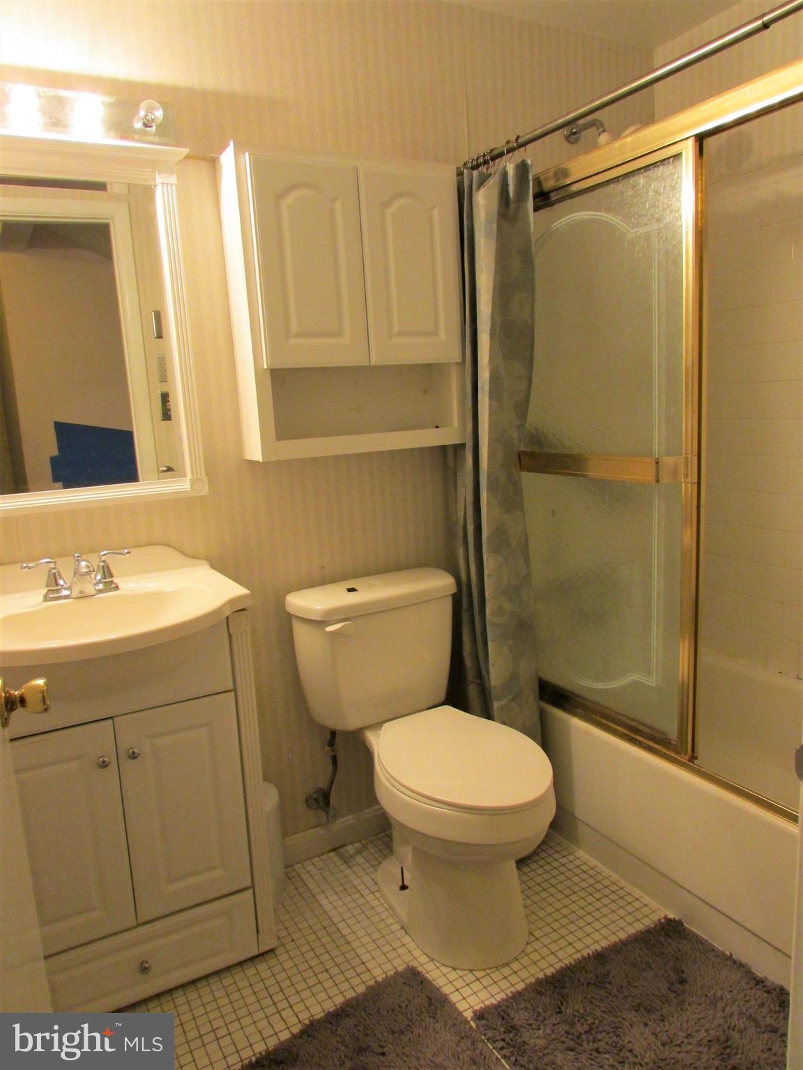 124 Redbud Road Edgewood, MD 21040 - Photo 12 of 12 a bathroom with a sink a toilet and shower