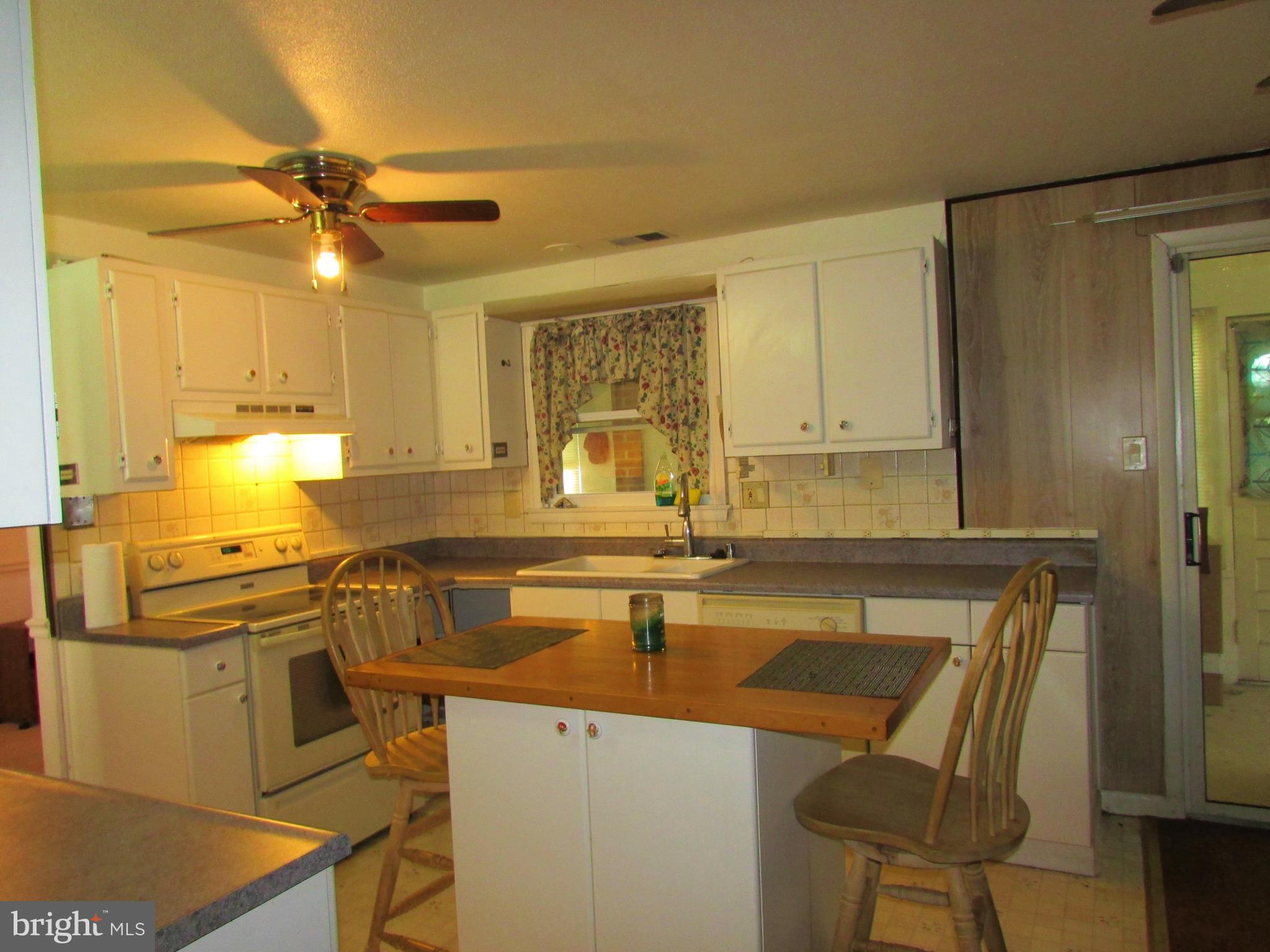 124 Redbud Road Edgewood, MD 21040 - Photo 5 of 12 a kitchen with a sink appliances and cabinets