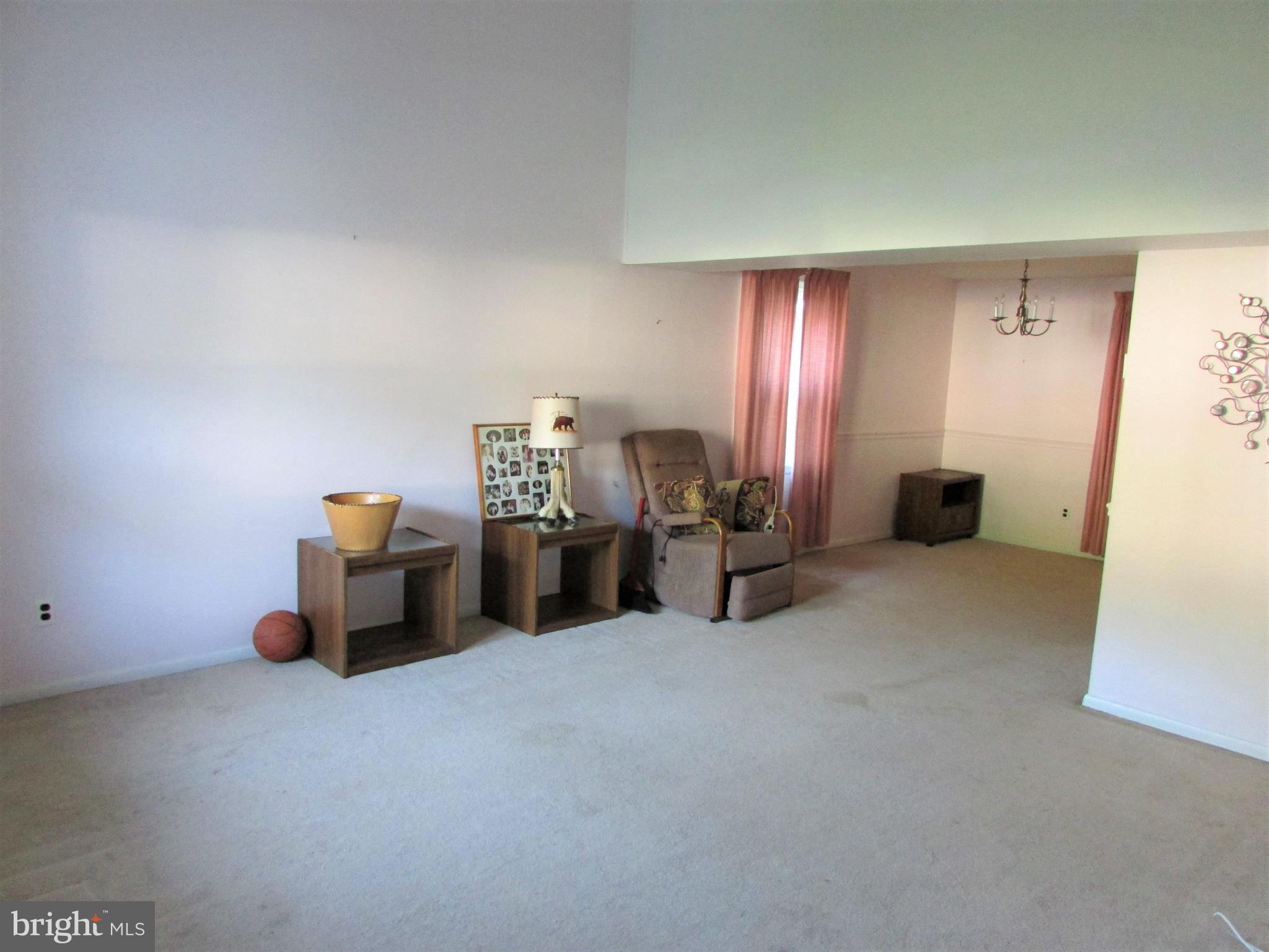 124 Redbud Road Edgewood, MD 21040 - Photo 7 of 12 a living room with furniture and a lamp