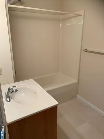 a bathroom with a sink and a bathtub