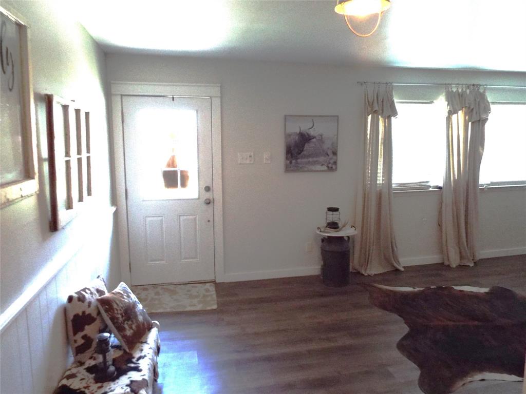 808 Shady Trail Athens, TX 75751 - Photo 11 of 22 a living room with furniture and a window