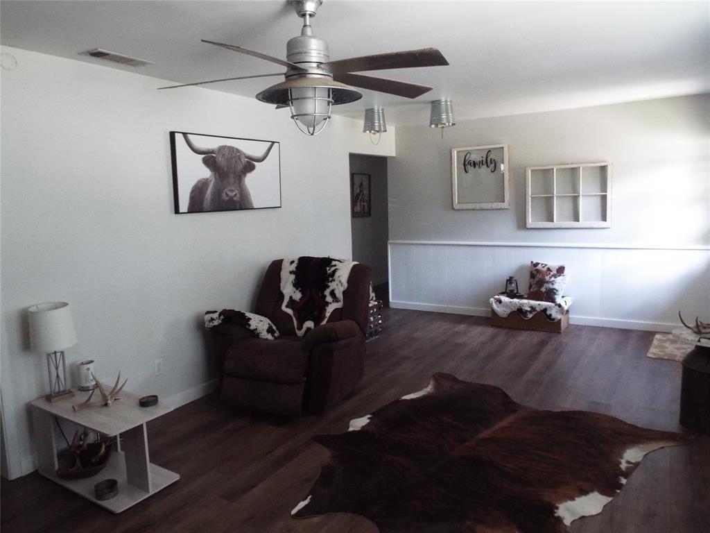 808 Shady Trail Athens, TX 75751 - Photo 17 of 22 a living room with furniture and a flat screen tv