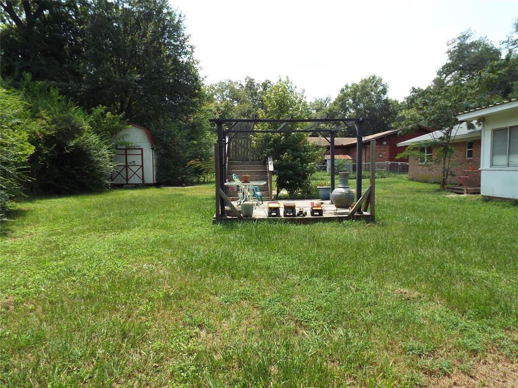 808 Shady Trail Athens, TX 75751 - Photo 6 of 22 a view of a table and chairs in the garden