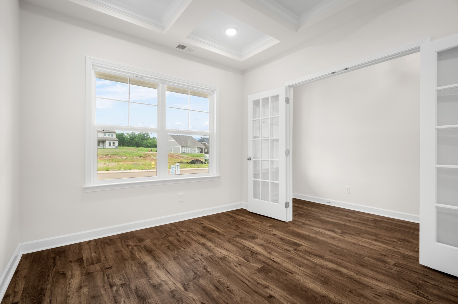 1733 Merkel Road Columbia, TN 38401 - Photo 10 of 53 an empty room with wooden floor and windows