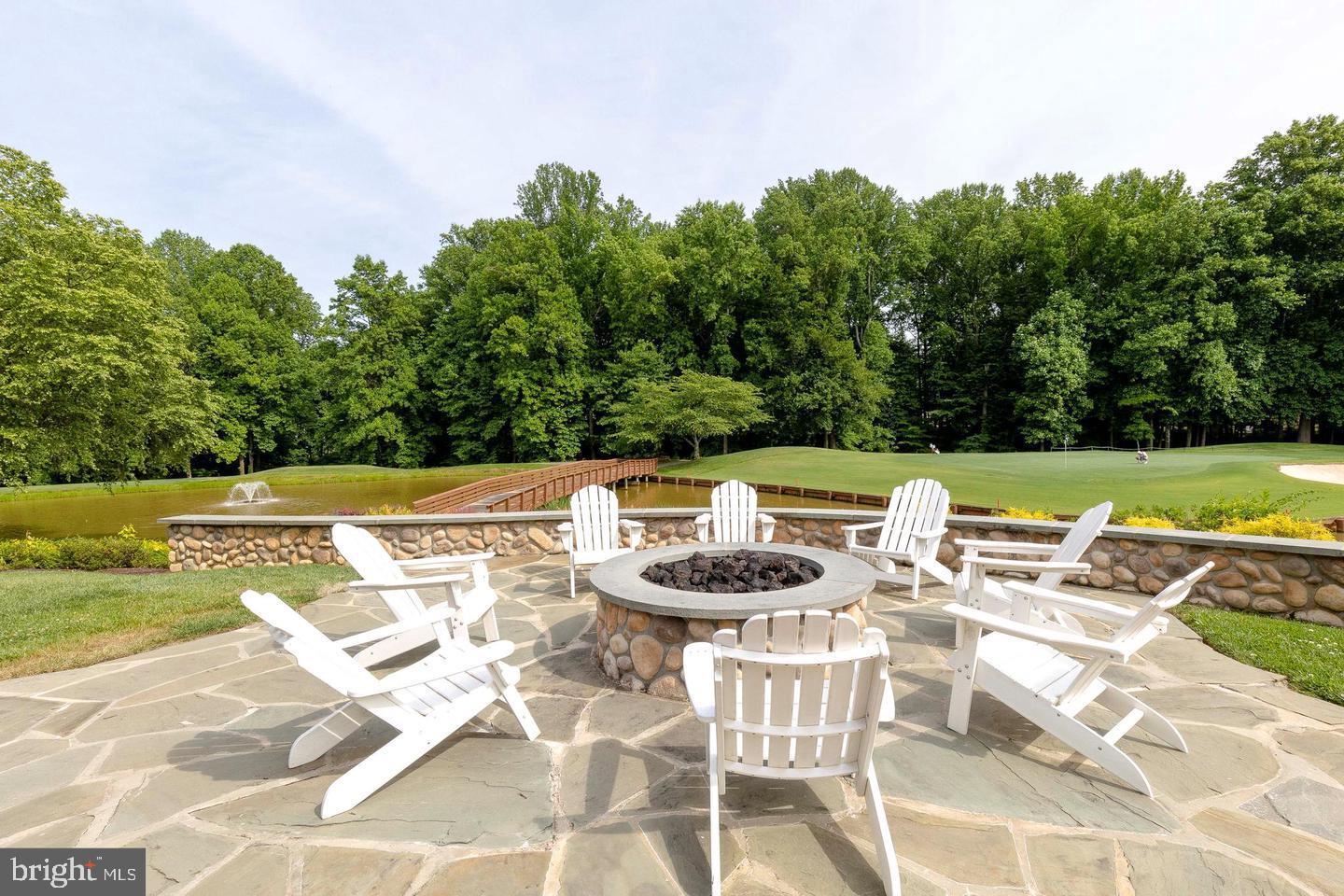 344 Colony Point Place Edgewater, MD 21037 - Photo 53 of 55 a view of an swimming pool and outdoor seating