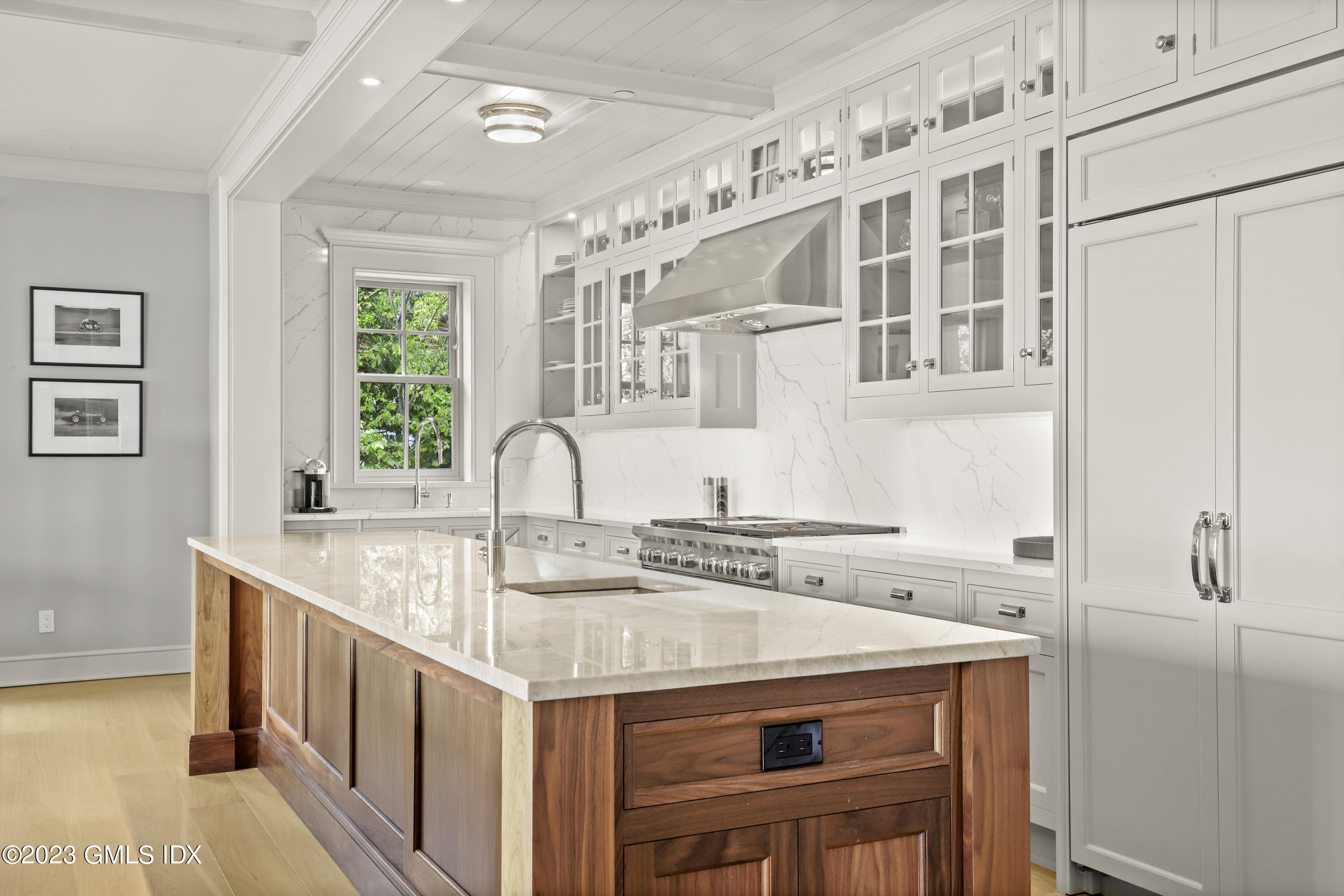702 Steamboat Road, Unit 1 Greenwich, CT 06830 - Photo 11 of 25 a kitchen with a sink a stove and a refrigerator