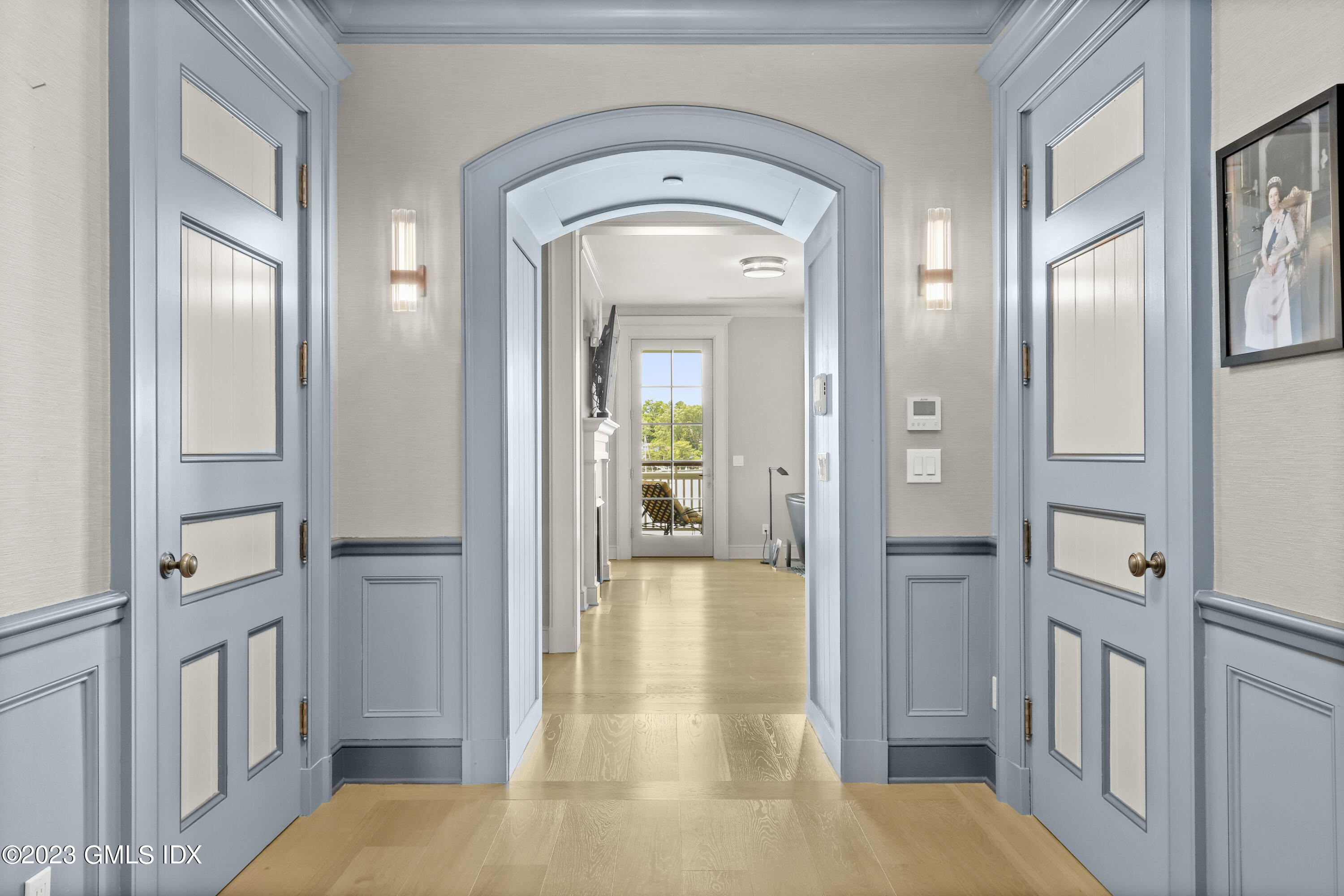 702 Steamboat Road, Unit 1 Greenwich, CT 06830 - Photo 13 of 25 a view of a hallway with a dining room view