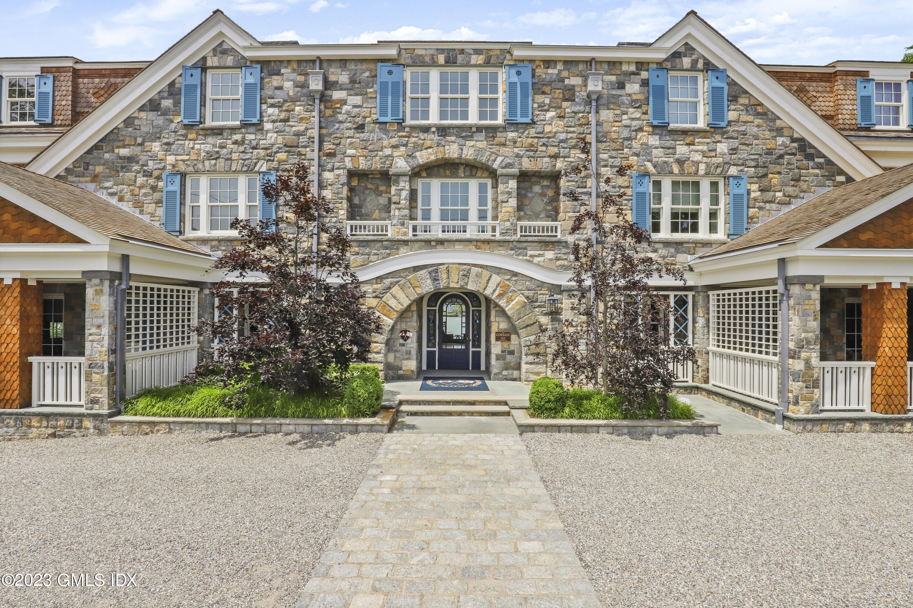 702 Steamboat Road, Unit 1 Greenwich, CT 06830 - Photo 22 of 25 front view of a house with a porch