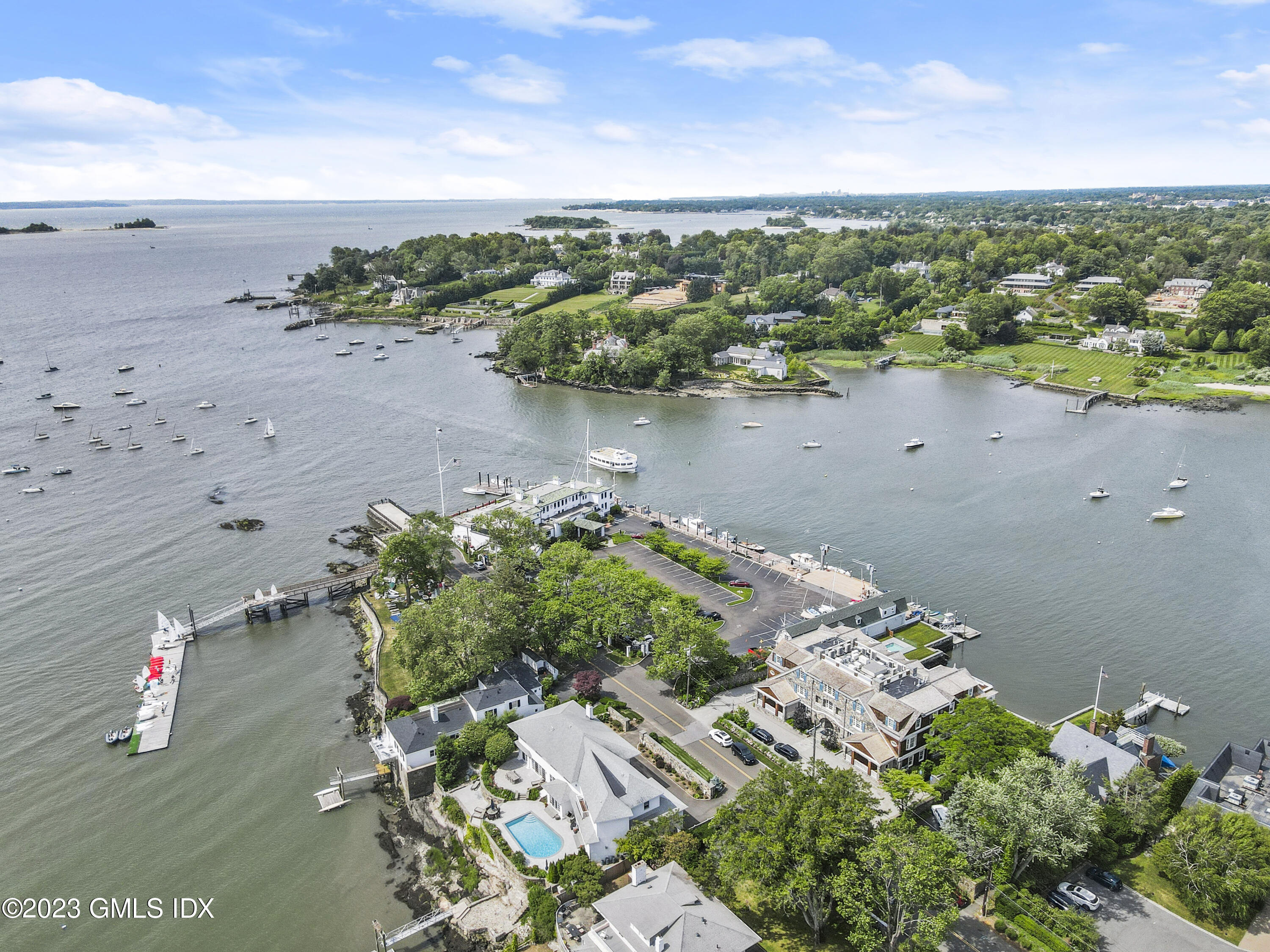 702 Steamboat Road, Unit 1 Greenwich, CT 06830 - Photo 24 of 25 an aerial view of a houses with beach