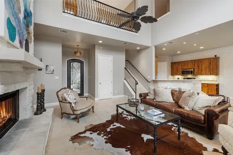 a kitchen with a refrigerator and a sink