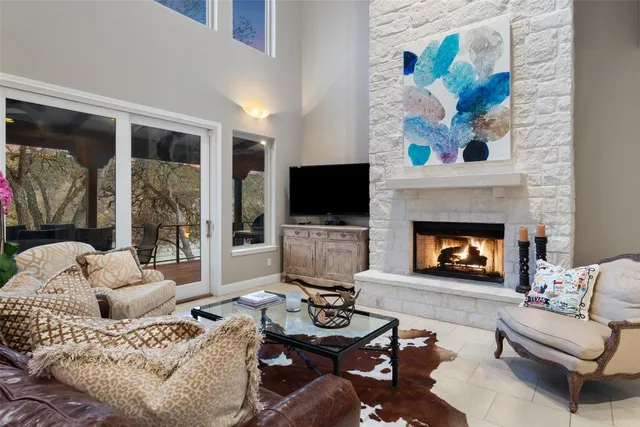 a spacious bedroom with a bed and a desk