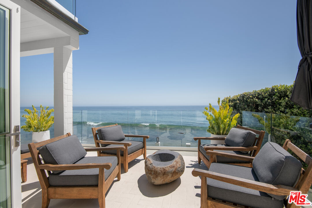 24134 Malibu Road Malibu, CA 90265 - Photo 27 of 39 a outdoor living space with furniture and city view