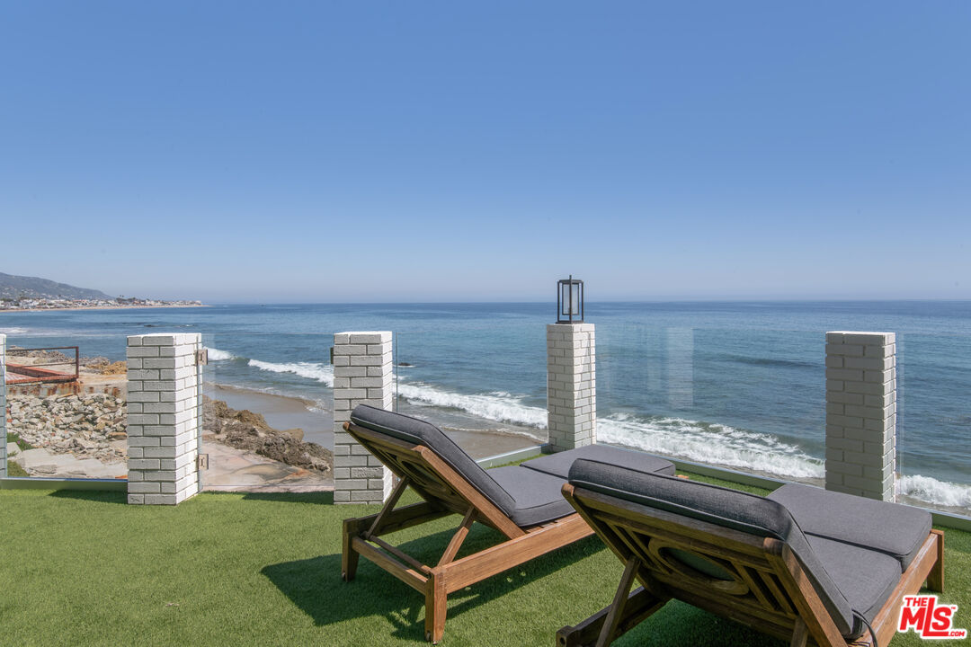 24134 Malibu Road Malibu, CA 90265 - Photo 31 of 39 a living room with furniture