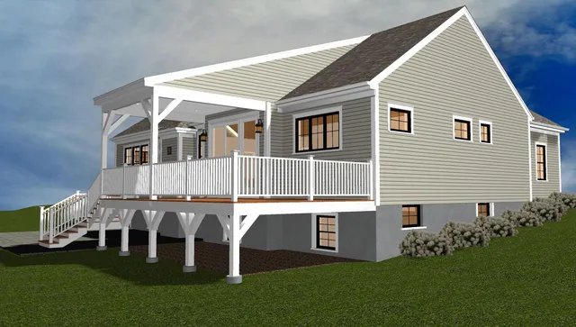 a front view of a house with a garden and deck