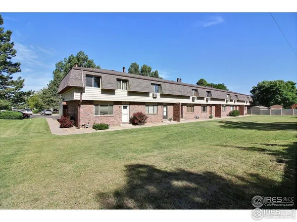 a view of a house with a big yard