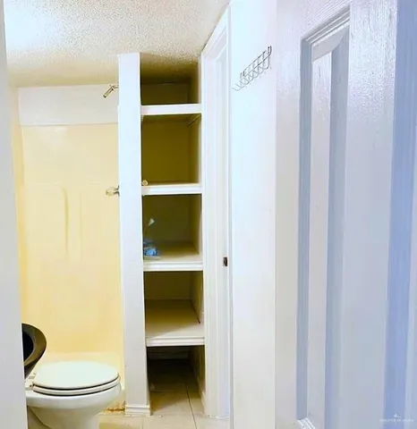a bathroom with a toilet