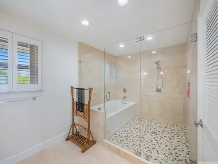 a bathroom with a sink and a large mirror