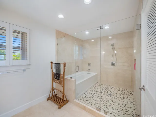 a bathroom with a sink and a large mirror