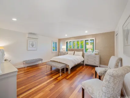 a view of a patio with table and chairs and potted plants