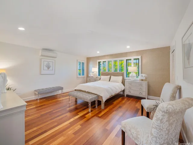 a view of a patio with table and chairs and potted plants