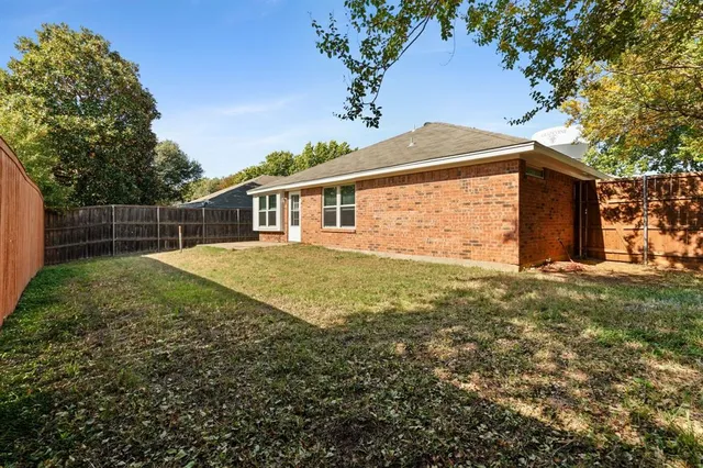 front view of a house with a large window
