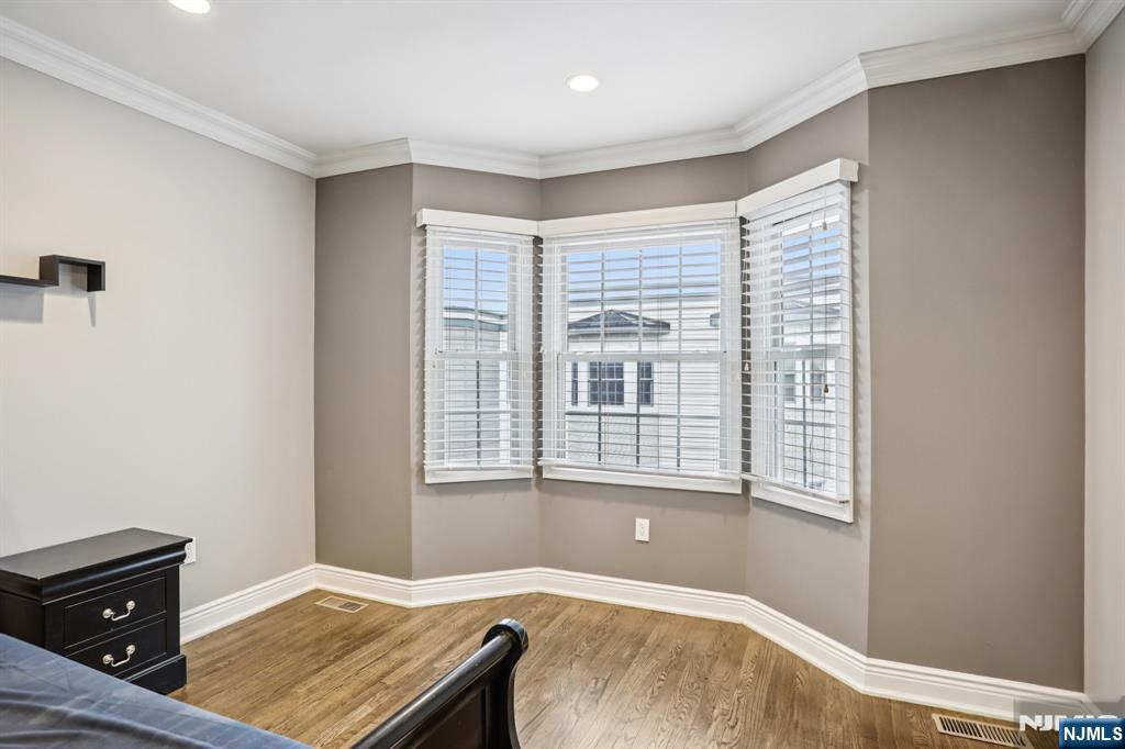 343 The Promenade, Unit 343 Edgewater, NJ 07020 - Photo 23 of 38 a workspace with furniture and window