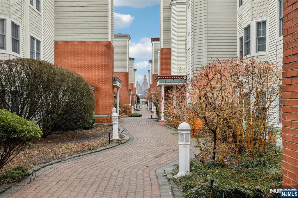 343 The Promenade, Unit 343 Edgewater, NJ 07020 - Photo 31 of 38 a view of a street with houses