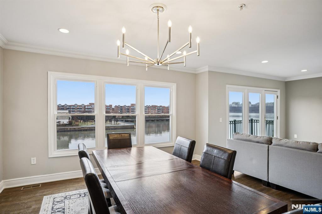 343 The Promenade, Unit 343 Edgewater, NJ 07020 - Photo 8 of 38 a view of a livingroom with furniture and window