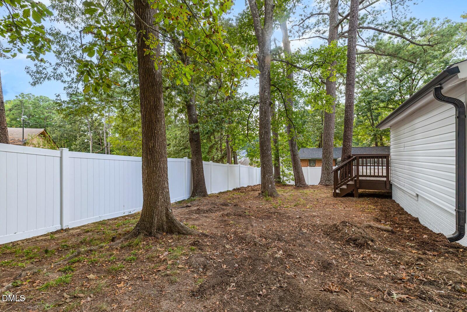3204 Friar Tuck Road Raleigh, NC 27610 - Photo 23 of 26 a view of a backyard