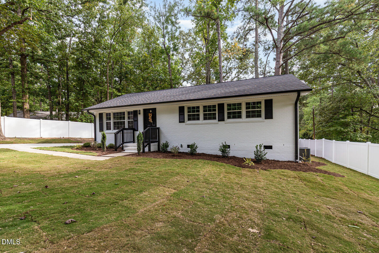 3204 Friar Tuck Road Raleigh, NC 27610 - Photo 3 of 26 a view of a house with pool and a yard