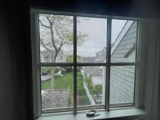 a view of room with window and floor to ceiling window