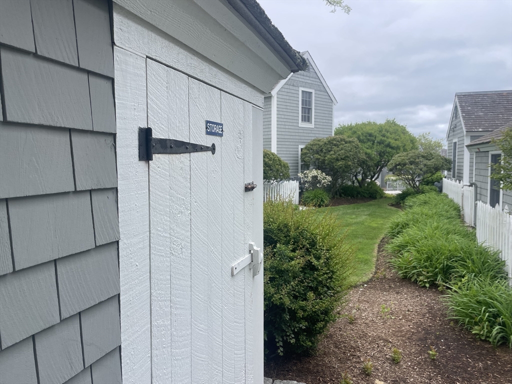 25 Milestone Way, Unit 25 Mashpee, MA 02649 - Photo 20 of 38 a view of a house with backyard