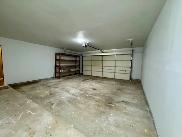 a view of a room with an empty space