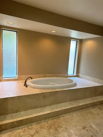 a bathroom with a bathtub