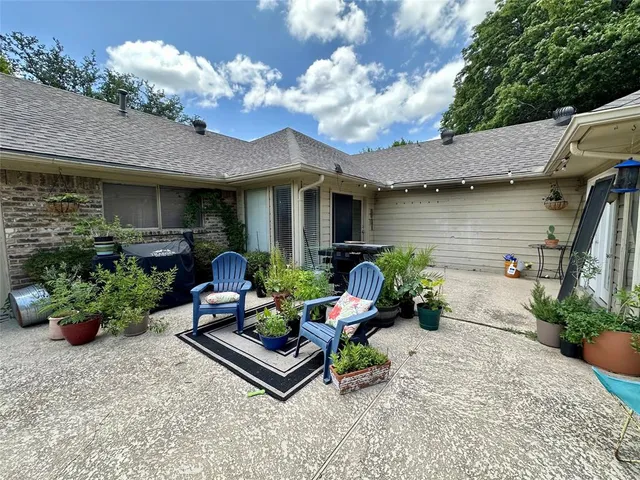 a garden view with a seating space