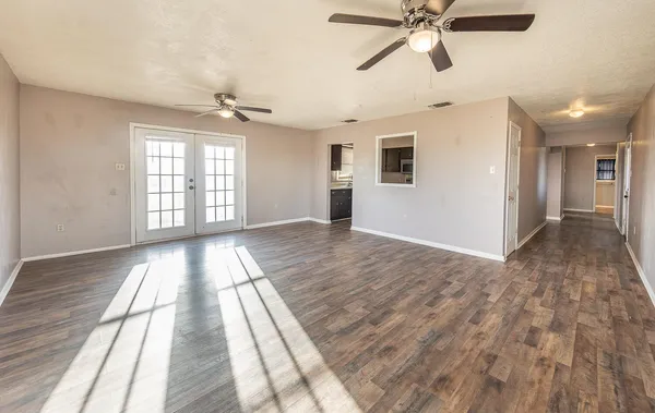 a view of an empty room and window